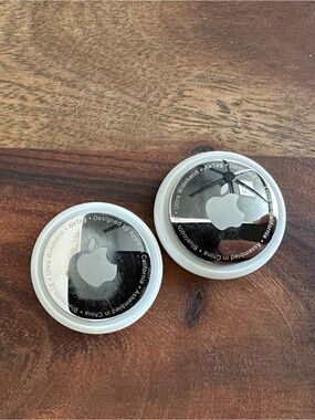 Apple AirTags some scuffs shown in photos